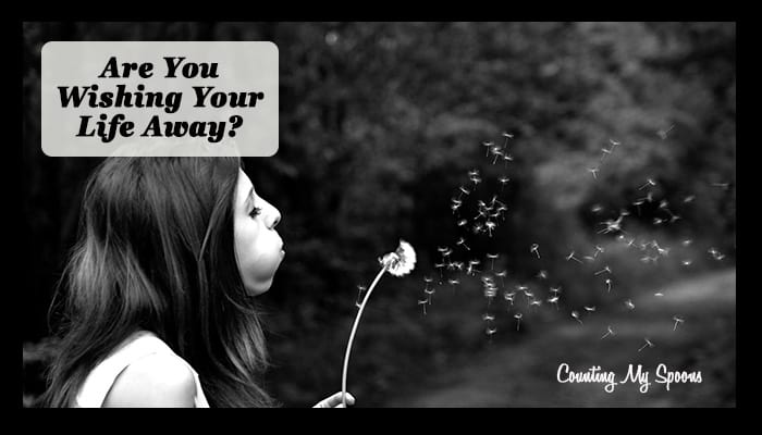 Are you wishing life away? (image of girl making wish while blowing on a dandelion)